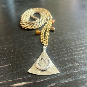 Beaded, Gold, Threaded Long Necklace with Indigenous Pendant “Musician”